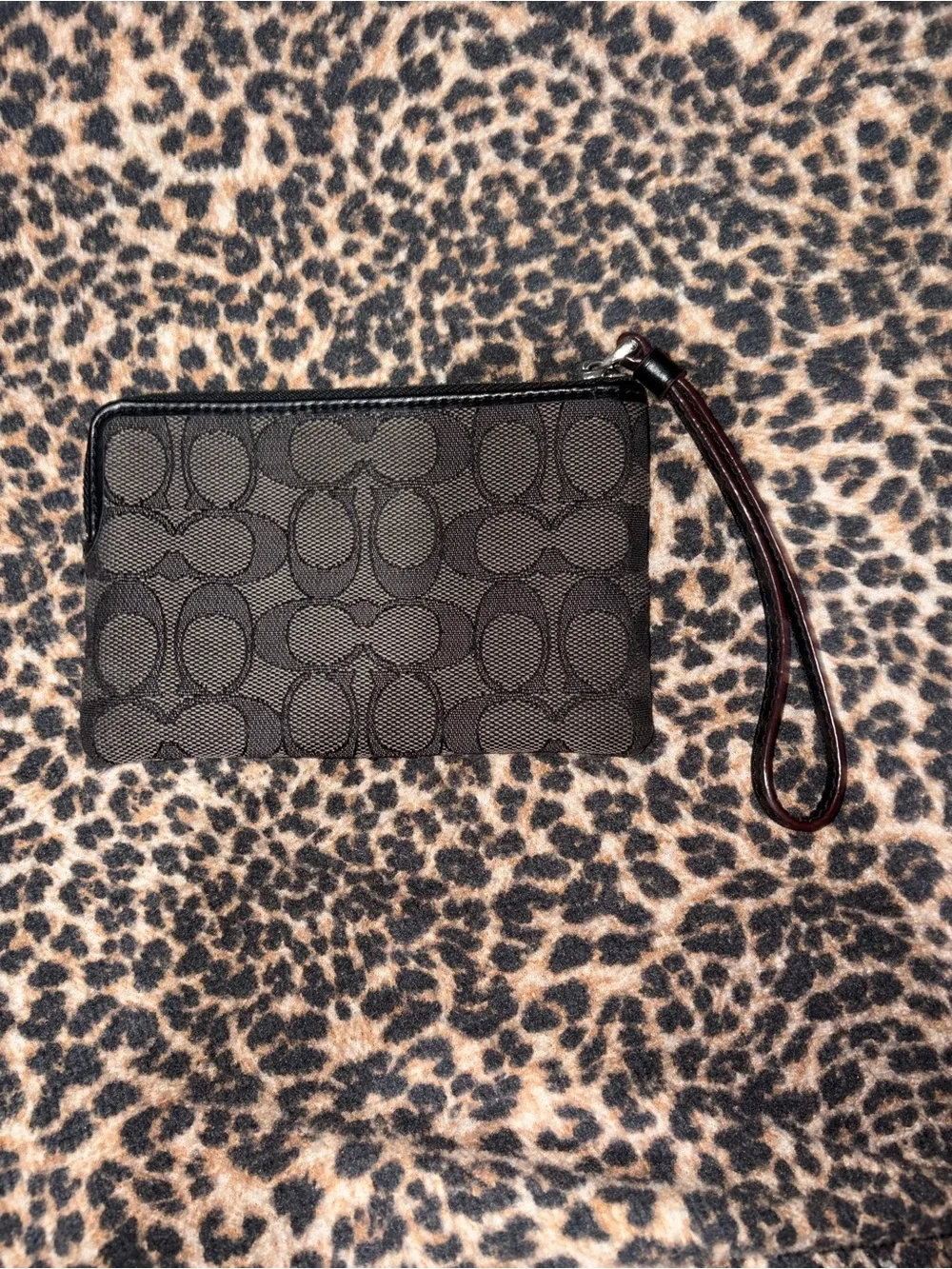 Coach Black Signature Pattern Zip Wristlet Phone Case